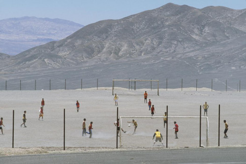  - Chile, 2000. Chuquicamata mining town in Atacama desert, football field on outskirts of town